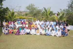 Nashik devotees gather for a group photo with the monastics.