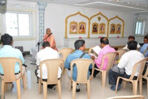 Swami Smaranananda address the press before three day programme at Vijayawada.