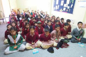 Group meditation before a class.