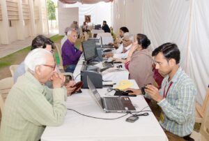 Devotees register for the Sangam.