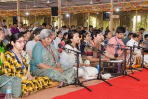 Devotees lead chanting before the inauguration ceremony.