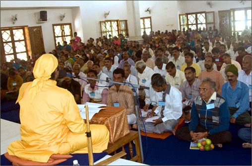 Devotees listening to Satsanga.