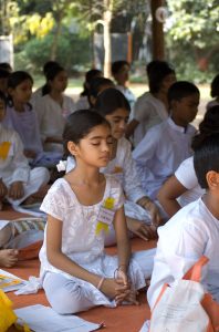 Children meditating.