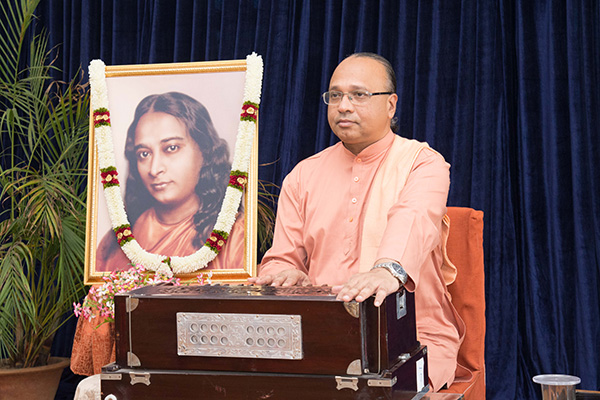 Swami Ishwarananda chanting cosmic chants