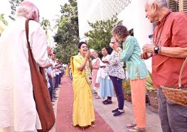 Brahmacharini Vaishnavi greets devotees.