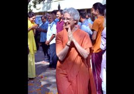 Brahmani Mai greets devotees during departure.