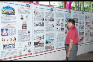 Devotee views the YSS picture gallery in Tamil, Madurai.