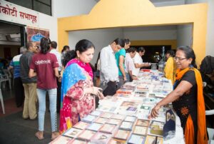 Attendees show interest at the book stall and...